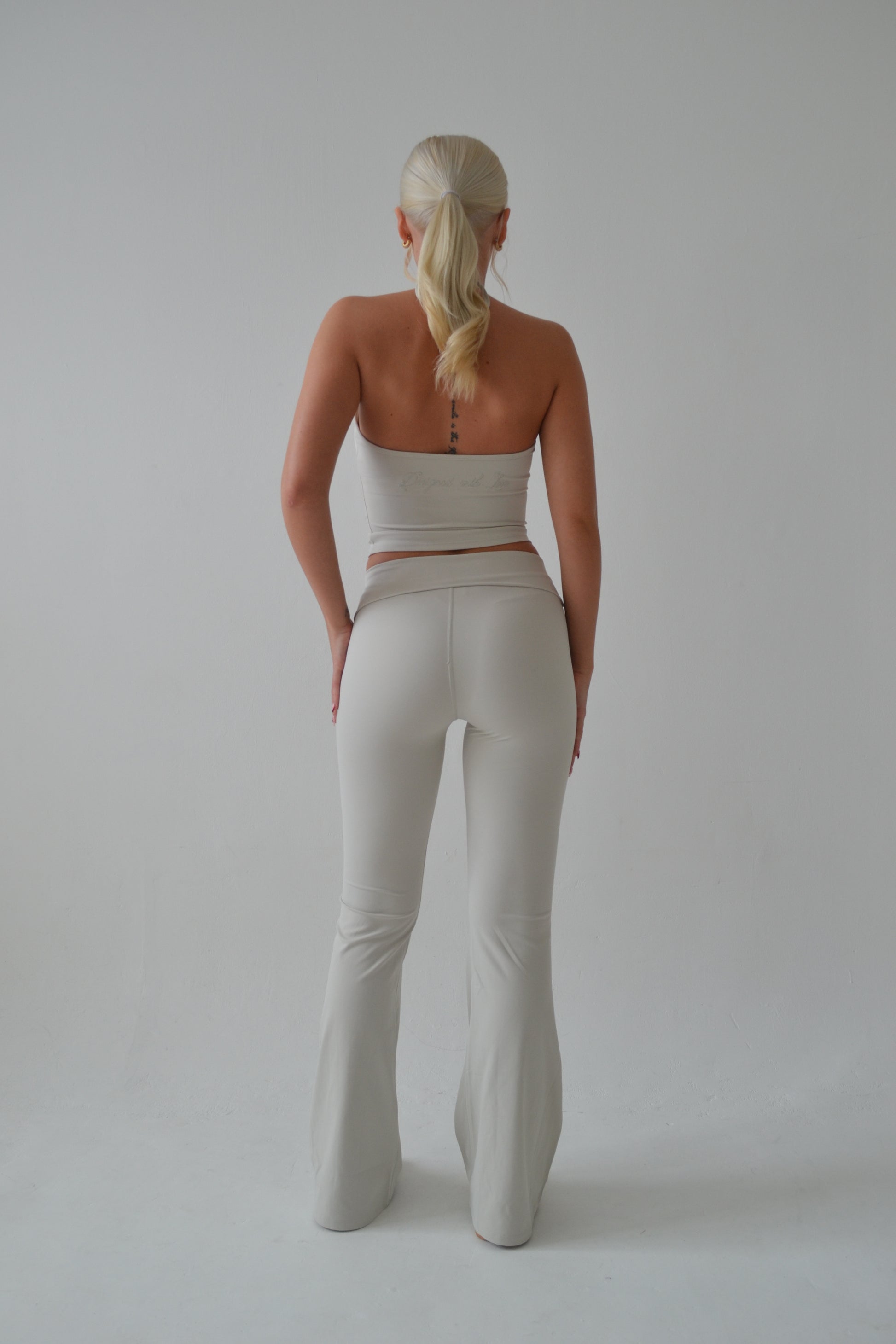 Cream fold over waist flare