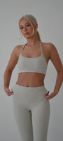 Cream halter neck sports bra
